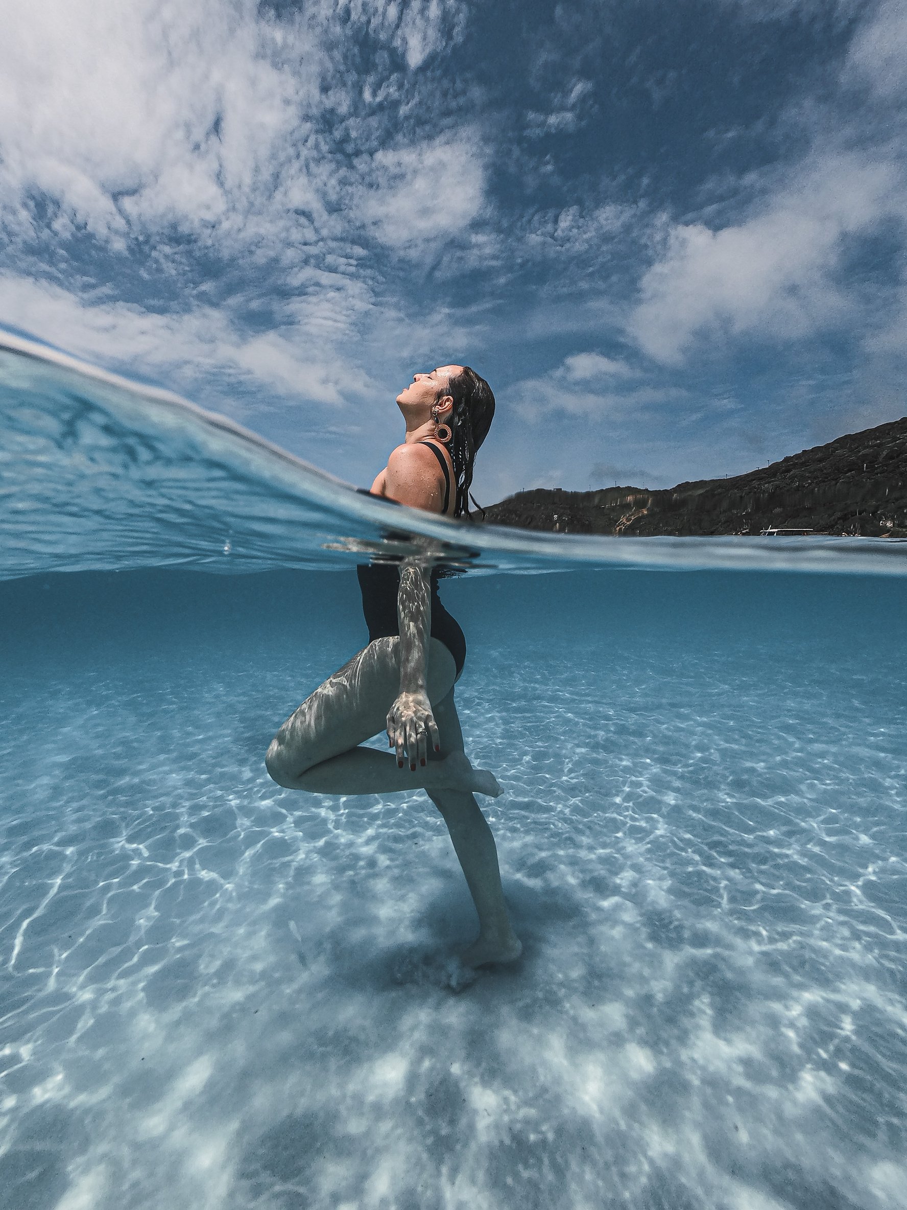 Woman in Black Bikini on Water